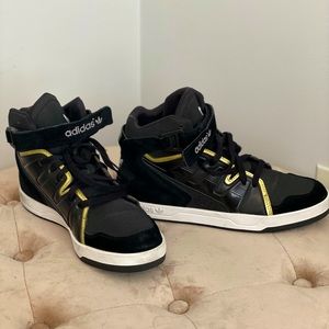 Adidas originals black and gold sneakers